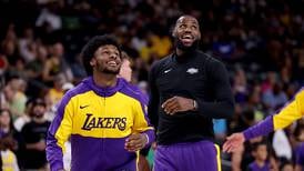 Photos: LeBron James, son Bronny make history with Lakers