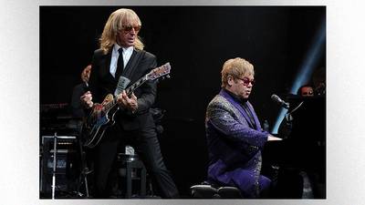 Elton John guitarist says band and crew will be "super masked up and tested every two days" on tour