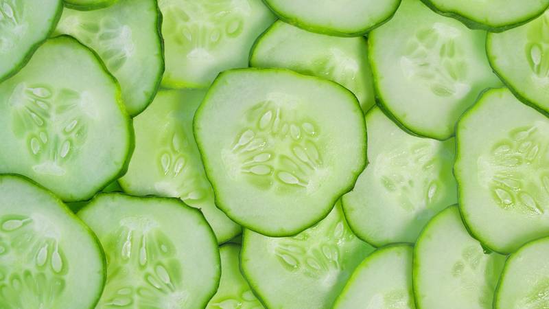 Cucumber slices texture background. fresh cucumbers diet dish