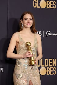 BEVERLY HILLS, CALIFORNIA - JANUARY 07: Emma Stone, winner of the Best Performance by an Actress in a Motion Picture, Musical or Comedy award for "Poor Things" poses in the press room during the 81st Annual Golden Globe Awards at The Beverly Hilton on January 07, 2024 in Beverly Hills, California. (Photo by Amy Sussman/Getty Images)